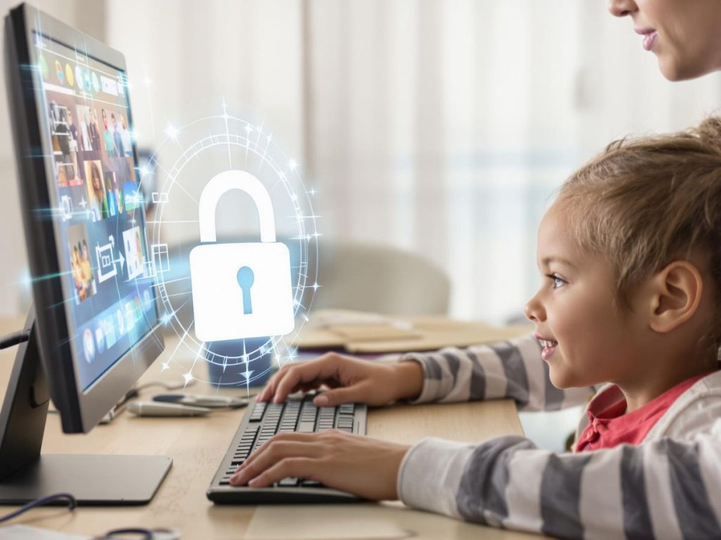 Părinte și copil folosind un computer împreună.